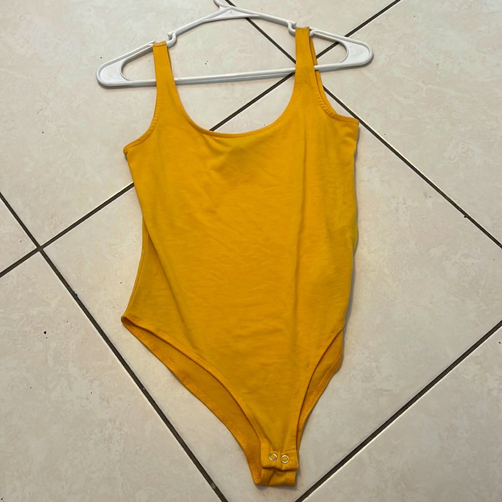 Yellow body suit